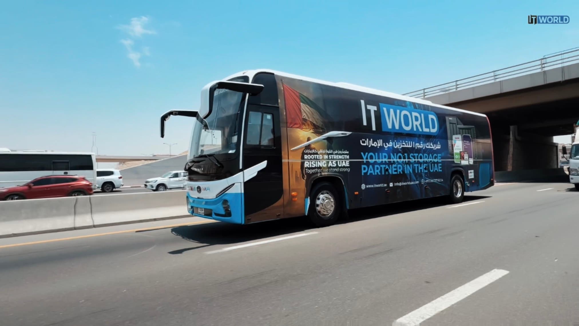 IT World Trading branded bus on a Dubai RTA route showcasing the storage partner campaign