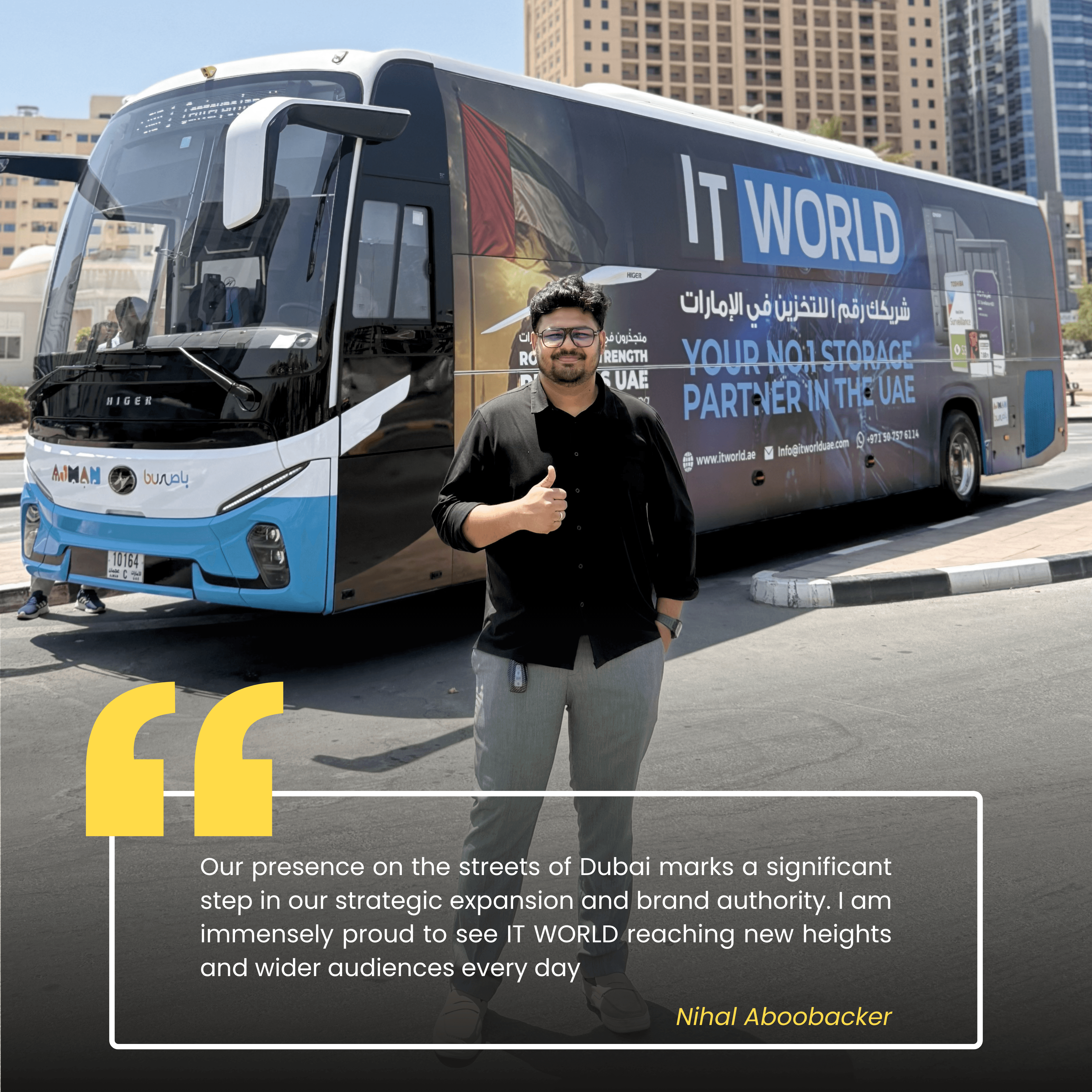 Nihal — IT World Trading team member, photographed beside the RTA campaign bus