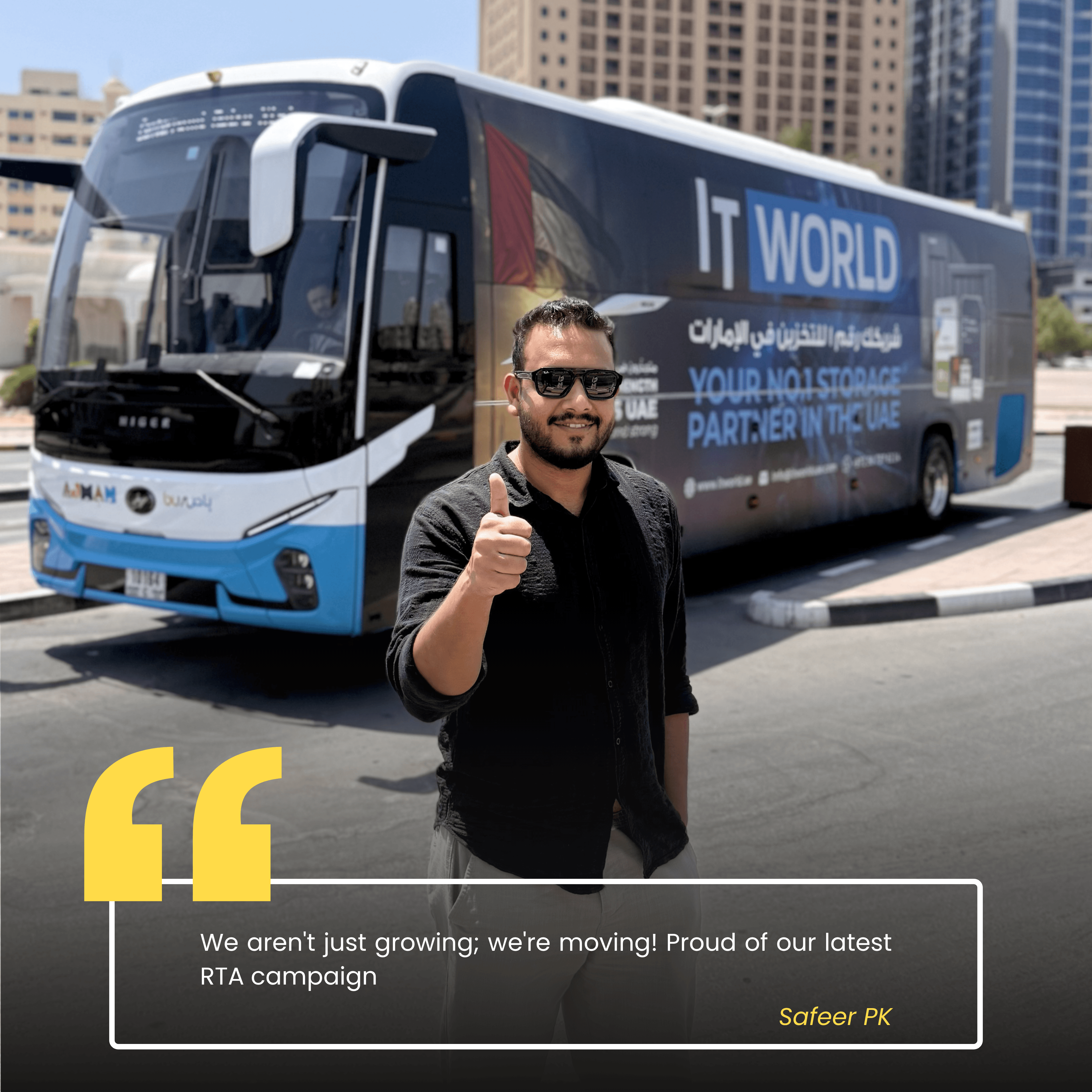 Safeer — IT World Trading team member, photographed beside the RTA campaign bus